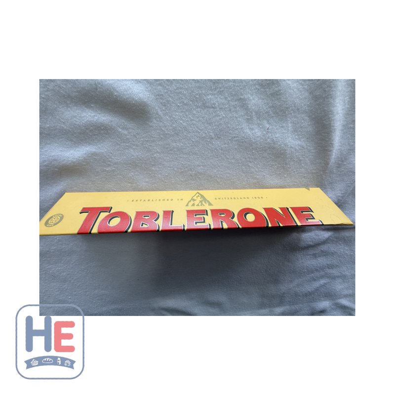 Toblerone Swiss Milk Chocolate Bar 100g (3.5oz) | HE hero 7614500010013